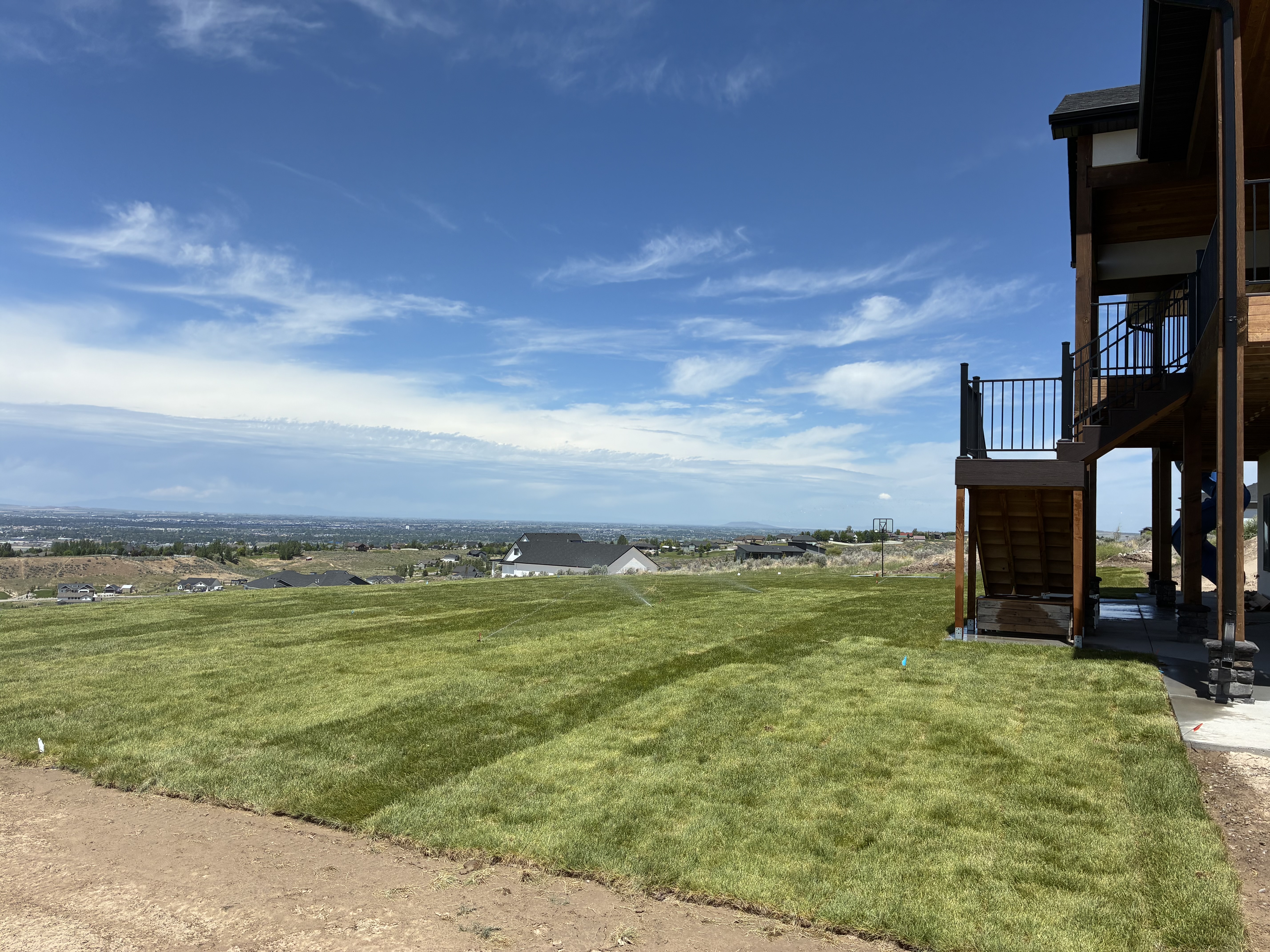 Hilltop backyard install with valley view