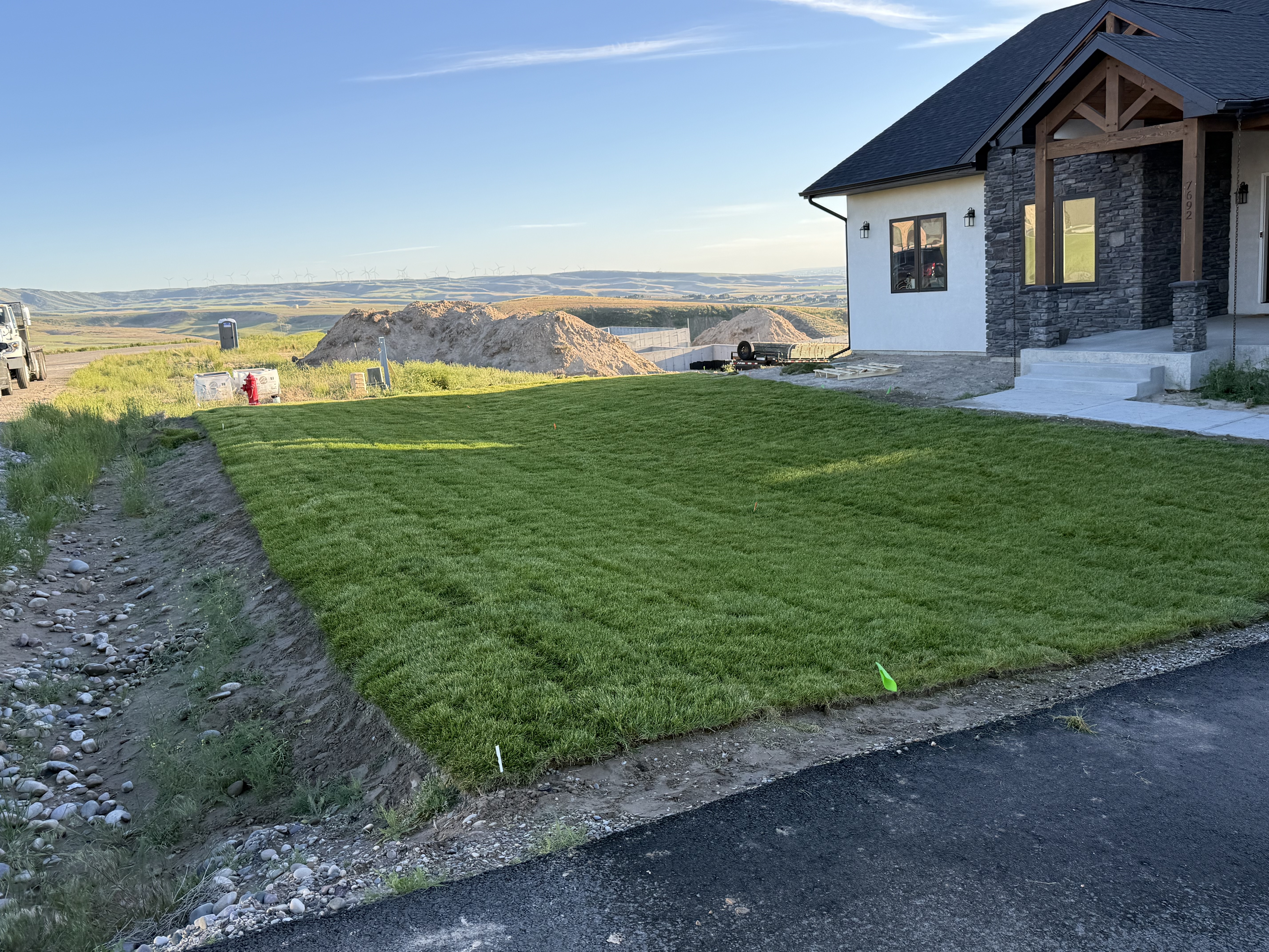 Newly installed lawn with mountain view