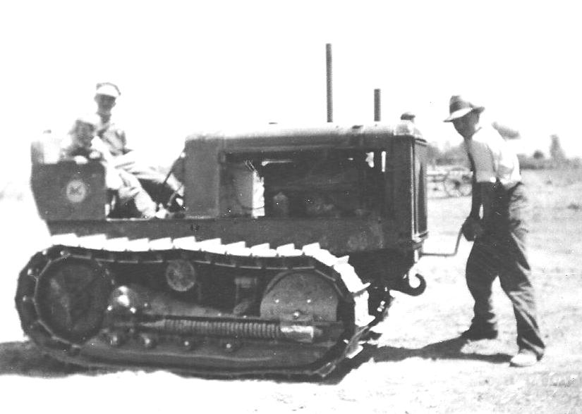 Vintage photo of an early Mountain River Sod family tractor